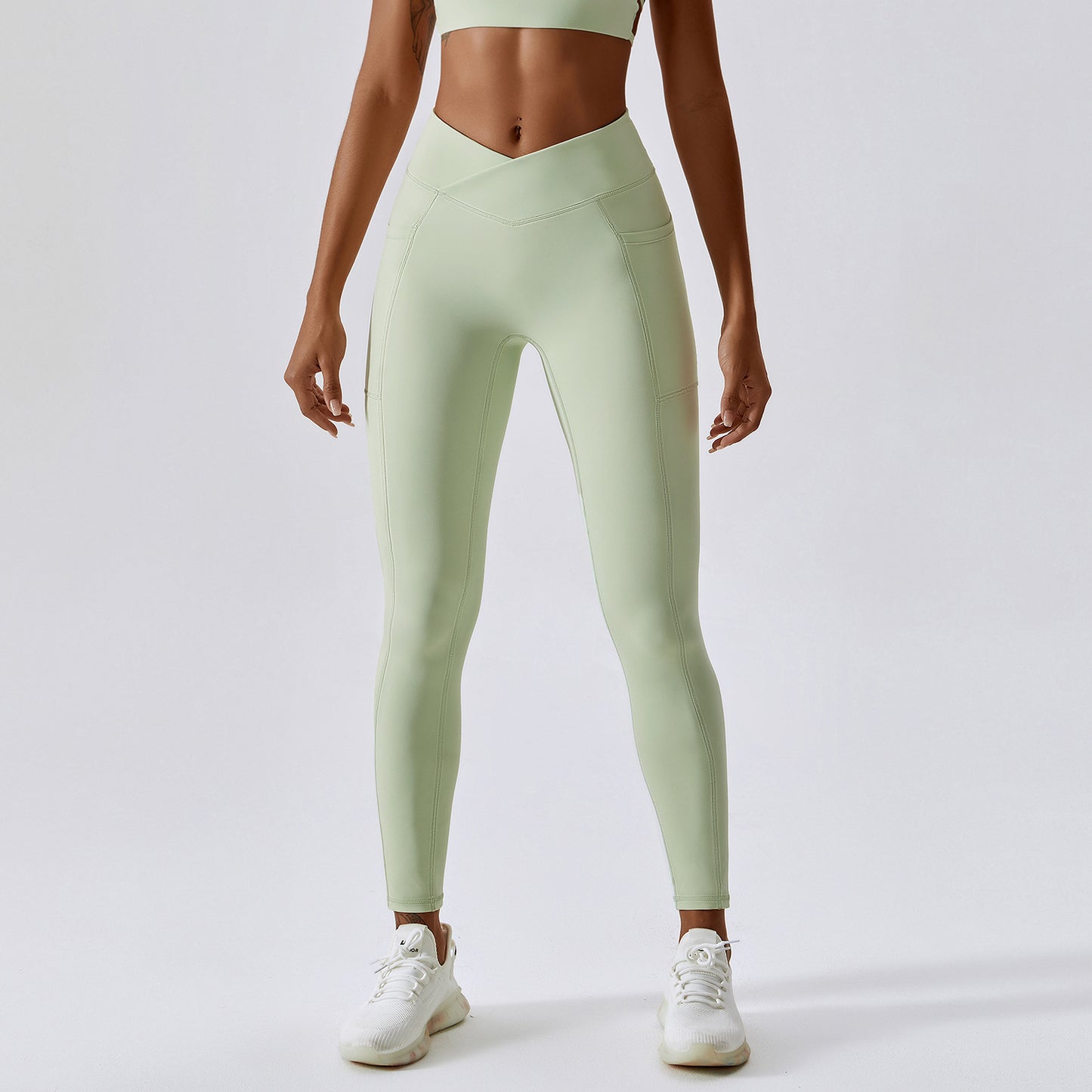 Nude Feel Yoga Pants Hip Lifting Pocket Quick Drying Fitness Pants Criss Cross Waist Head Skinny Running Sports Pants Women